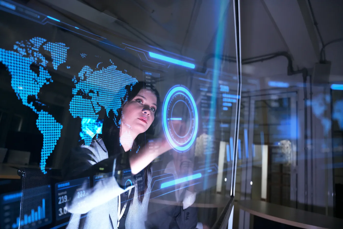Woman interacting with a digital interface showing a world map